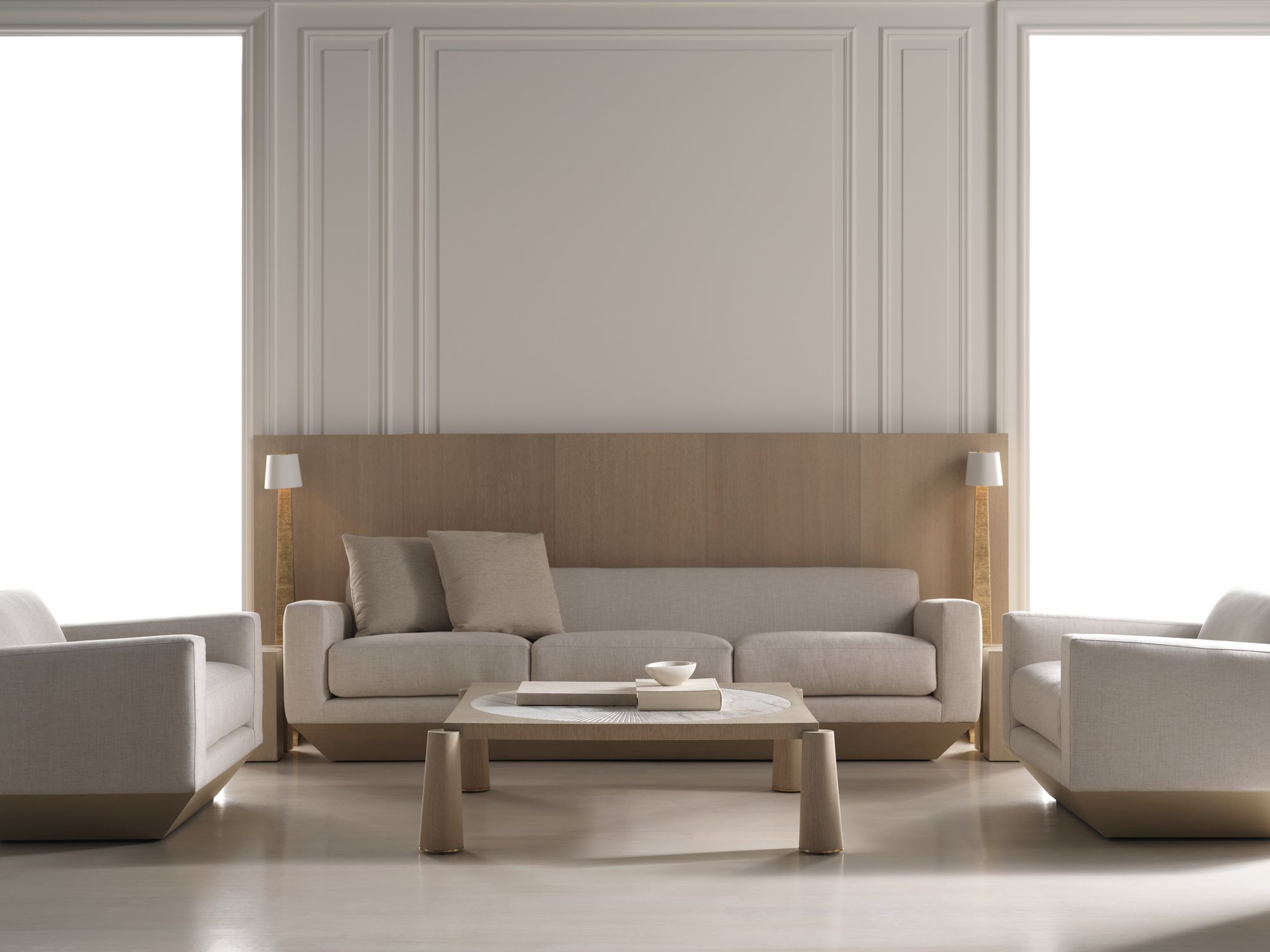 Baker Furniture neutral living room with sofa, armchairs and a low coffee table